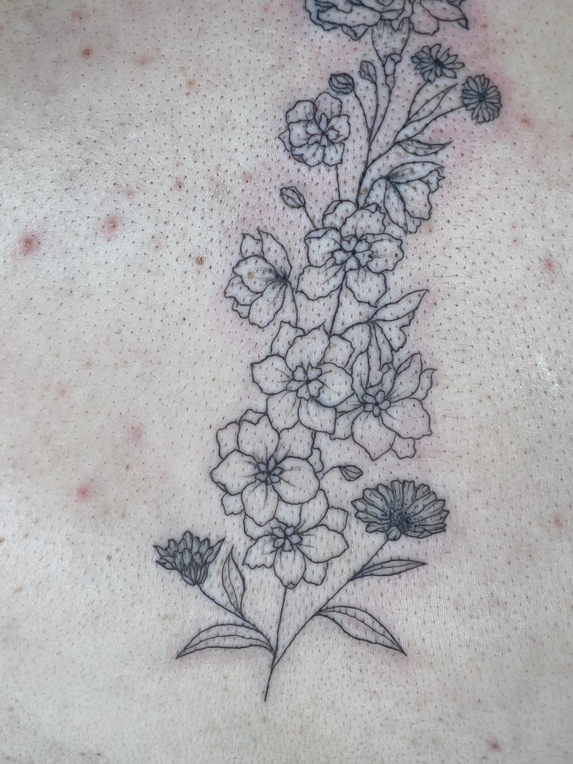 Tatouage personnalisé floral pour Justine
