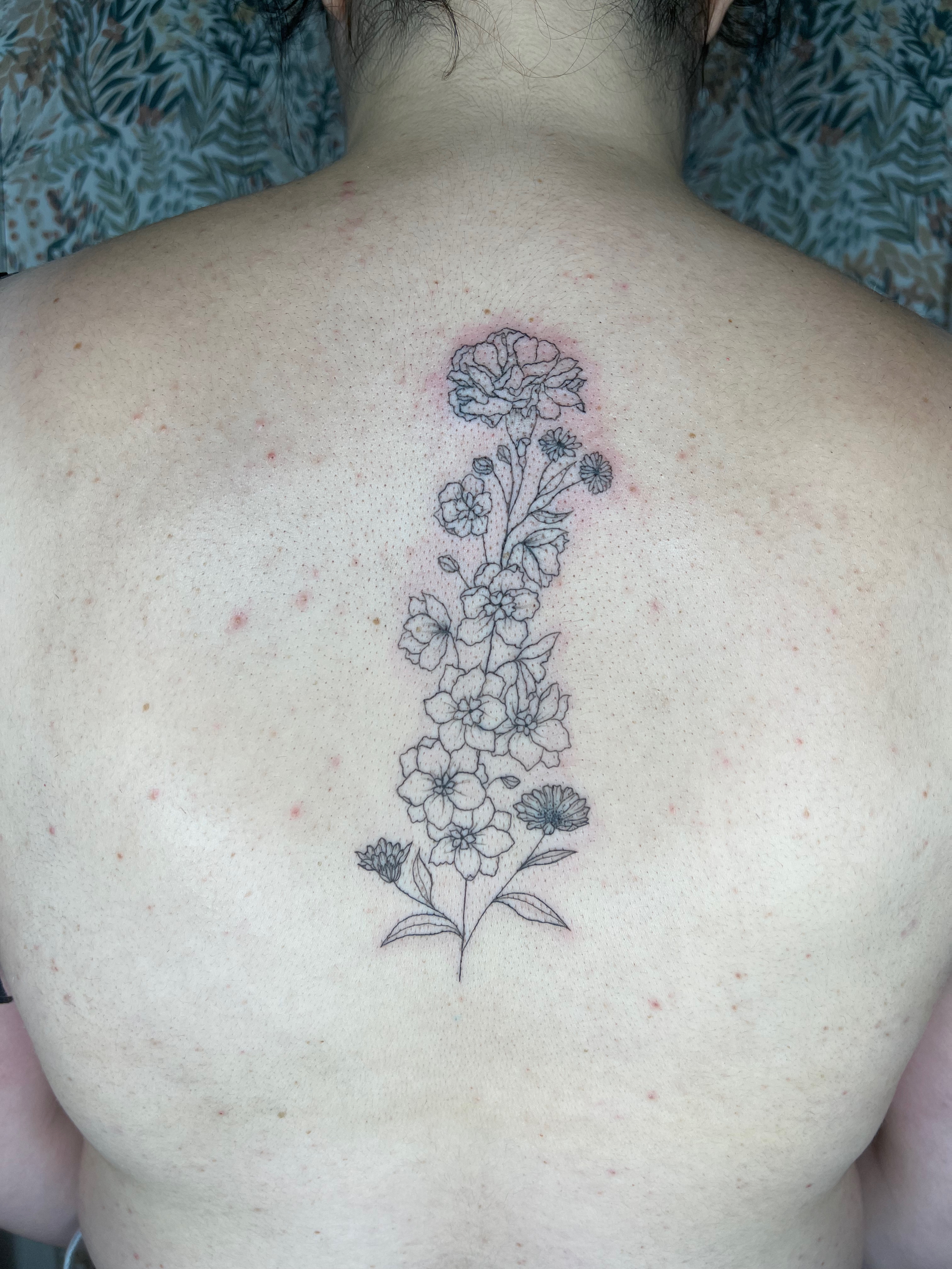 Tatouage personnalisé floral pour Justine